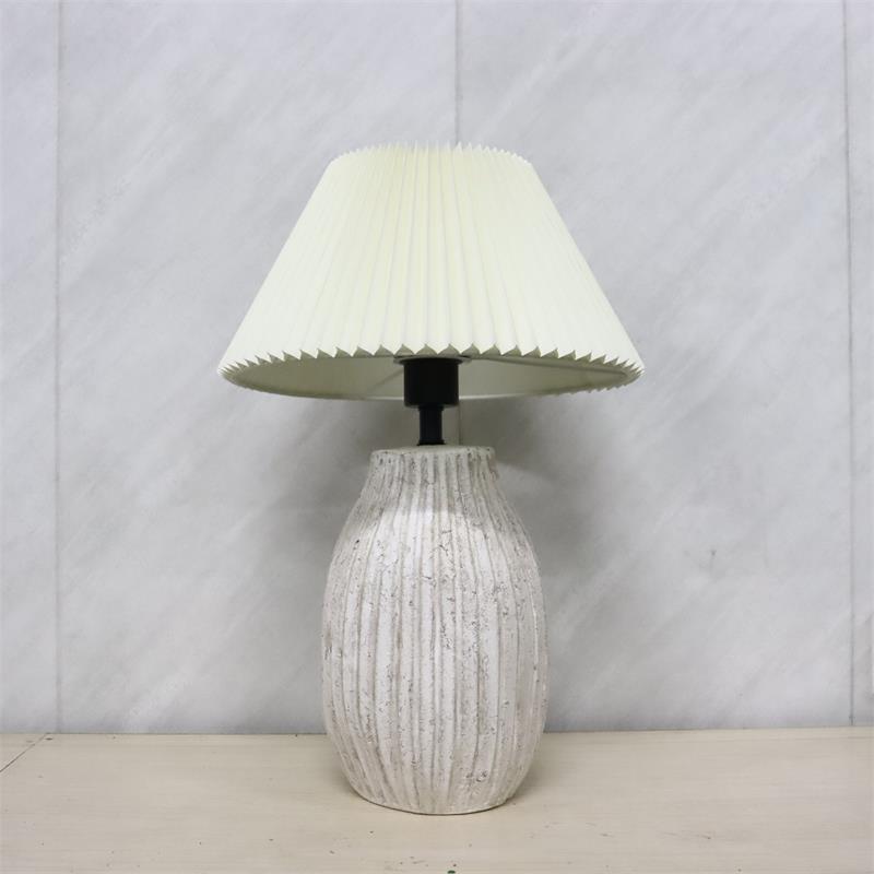 Pleated tower shaped ceramic table lamp
